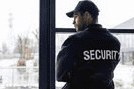 Security officer at a window
